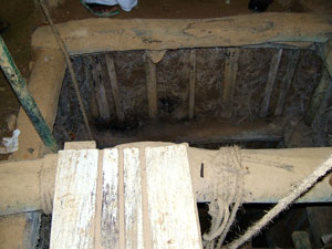 The inside of a mine. To prevent the mine collapsing, a wooden structure is used.